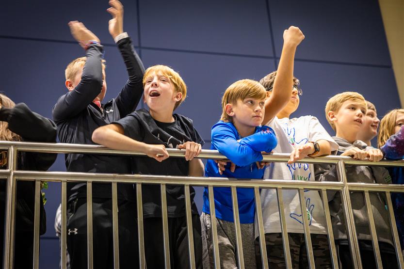 Middle and high school students learning about drone soccer